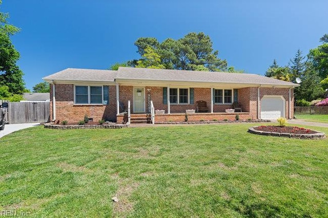 1609 Macgregory Ct, Virginia Beach, VA 23464 - single story home with fence, a front yard, brick siding, an attached garage, and driveway