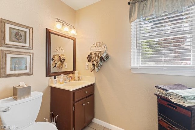 1609 Macgregory Ct, Virginia Beach, VA 23464 - half bathroom with vanity, baseboards, tile patterned flooring, and toilet