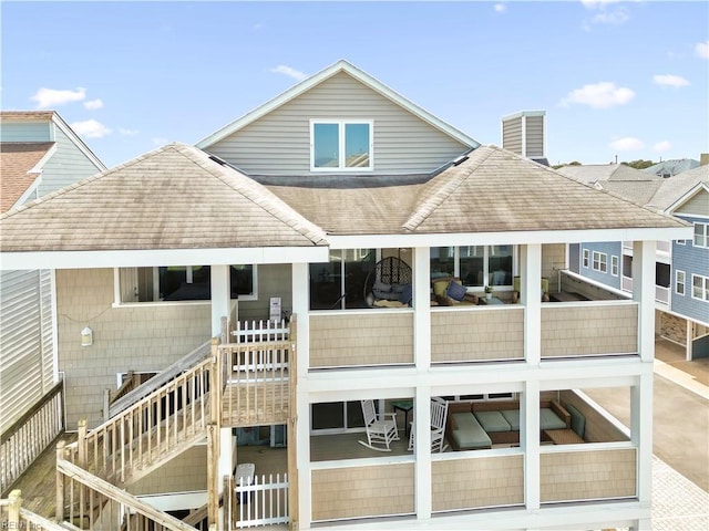 2304 Poseidon Ct, Virginia Beach, VA 23451 - back of property with a chimney, roof with shingles, and stairs