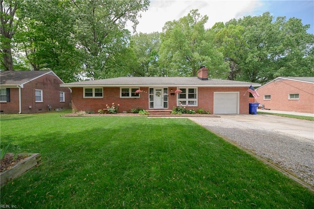 single story home with brick siding, an attached garage, driveway, and a chimney