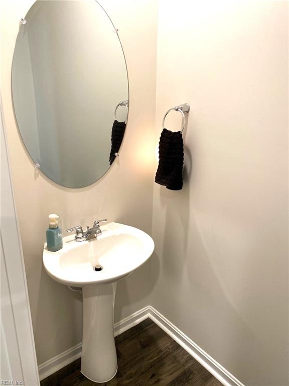 1547 Stanford Ln, Newport News, VA 23608 - bathroom with wood finished floors and baseboards