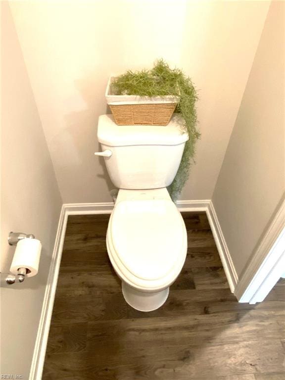 1547 Stanford Ln, Newport News, VA 23608 - bathroom with wood finished floors, toilet, and baseboards