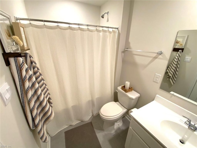 1547 Stanford Ln, Newport News, VA 23608 - full bathroom featuring a shower with curtain, tile patterned floors, vanity, and toilet