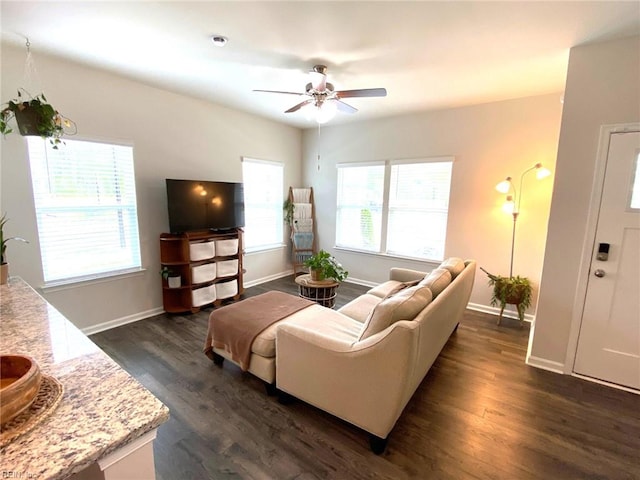 1547 Stanford Ln, Newport News, VA 23608 - living room with ceiling fan, baseboards, and dark wood-style flooring