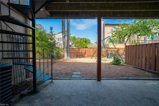 doorway to outside featuring carpet flooring