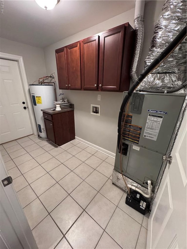 35 Miles Cary Mews, Hampton, VA 23669 - clothes washing area featuring washer hookup, water heater, heating unit, light tile patterned flooring, and cabinet space