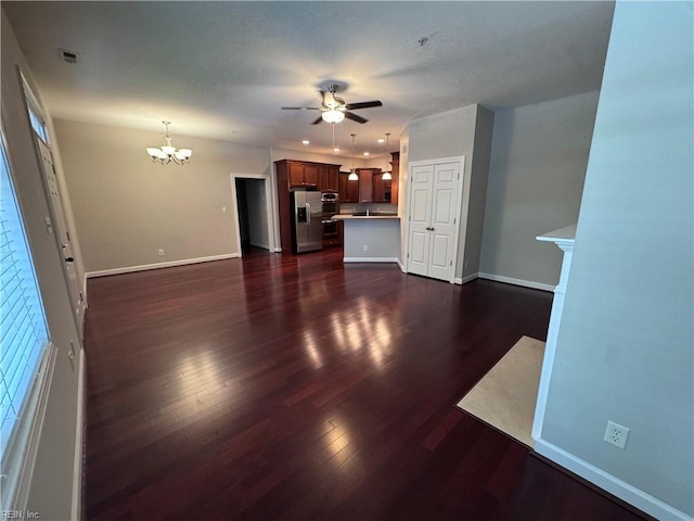35 Miles Cary Mews, Hampton, VA 23669 - unfurnished living room with dark wood-style flooring, baseboards, and ceiling fan with notable chandelier