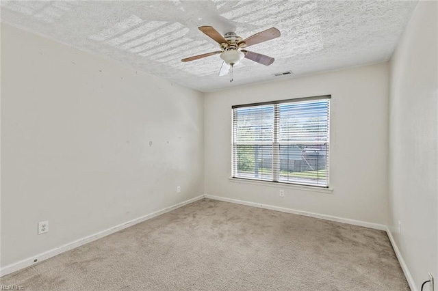 3605 Shell Rd, Hampton, VA 23661 - spare room with baseboards, visible vents, a textured ceiling, and carpet