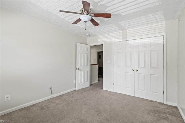 3605 Shell Rd, Hampton, VA 23661 - unfurnished bedroom with carpet, ceiling fan, a closet, and baseboards