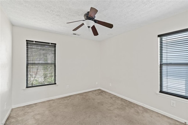 3605 Shell Rd, Hampton, VA 23661 - unfurnished room featuring visible vents, a wealth of natural light, carpet floors, and baseboards