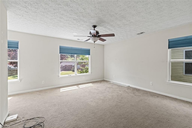 3605 Shell Rd, Hampton, VA 23661 - unfurnished room featuring visible vents, ceiling fan, carpet flooring, and baseboards