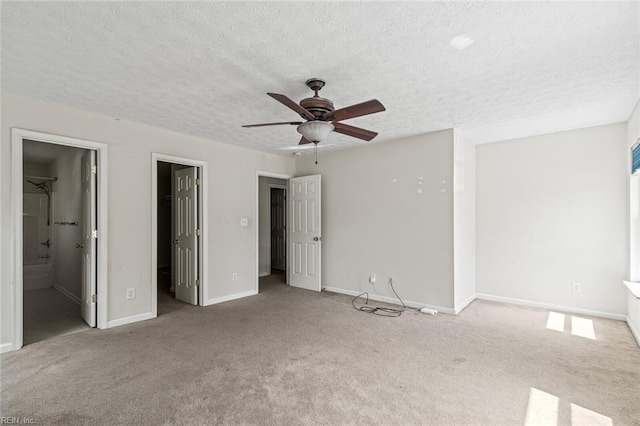 3605 Shell Rd, Hampton, VA 23661 - unfurnished bedroom featuring a textured ceiling, carpet flooring, ceiling fan, and baseboards