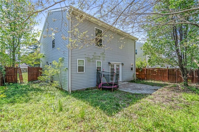 3605 Shell Rd, Hampton, VA 23661 - rear view of house featuring a lawn, french doors, a fenced backyard, and a patio area