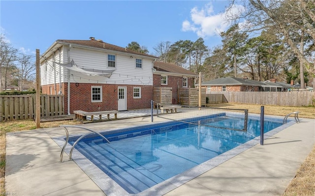 view of pool with a fenced in pool, a patio area, and a fenced backyard