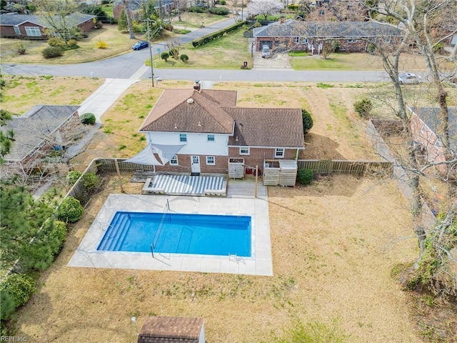 view of swimming pool with a fenced backyard and a fenced in pool