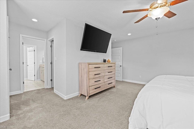 bedroom featuring recessed lighting, baseboards, light colored carpet, and ceiling fan