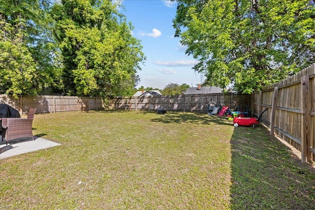 view of yard featuring a fenced backyard