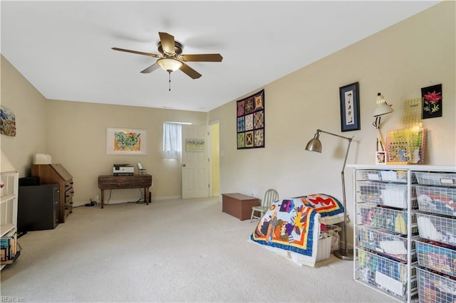 game room with carpet flooring, baseboards, and a ceiling fan