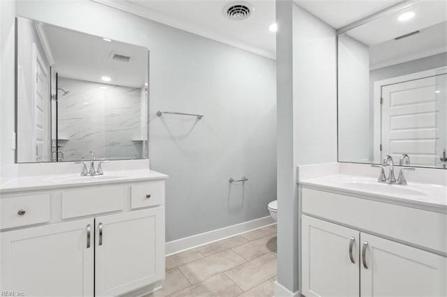 bathroom with a marble finish shower, a sink, and visible vents