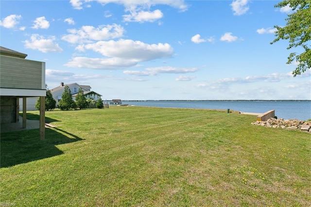 view of yard with a water view
