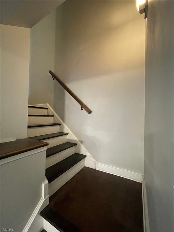 staircase with baseboards