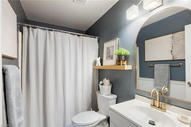 5081 Gatehouse Way, Virginia Beach, VA 23455 - full bathroom featuring vanity, toilet, a wainscoted wall, and curtained shower
