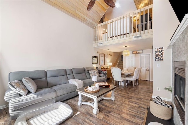 5081 Gatehouse Way, Virginia Beach, VA 23455 - living area with visible vents, a fireplace, wood finished floors, high vaulted ceiling, and stairs