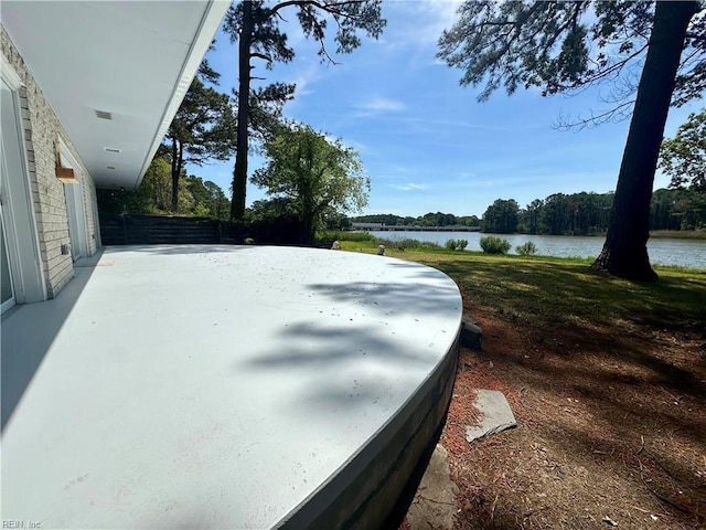 exterior space with a water view