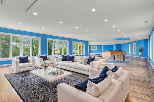 living room featuring billiards, attic access, recessed lighting, and wood finished floors
