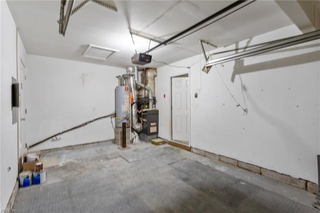 garage with water heater and a garage door opener