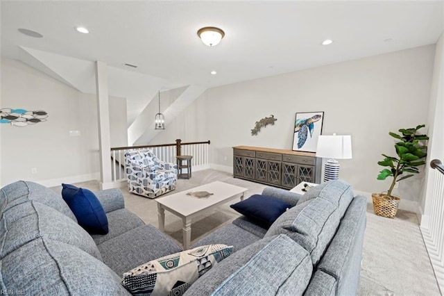 living area with baseboards, recessed lighting, visible vents, and carpet floors