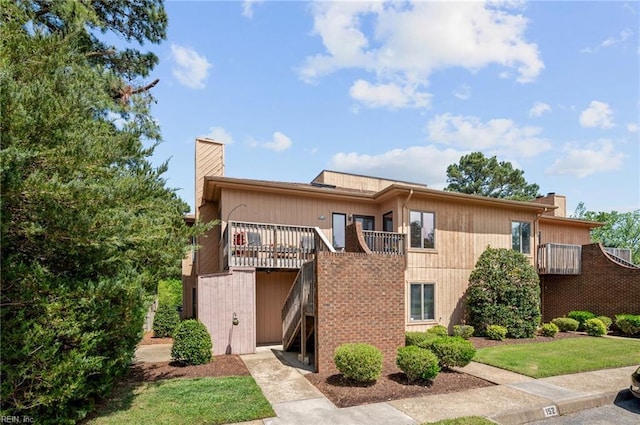 view of front of property with a chimney