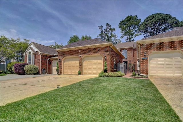 single story home with brick siding, fence, a garage, a front lawn, and concrete driveway