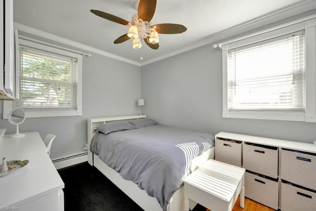 bedroom featuring baseboard heating, ornamental molding, and ceiling fan