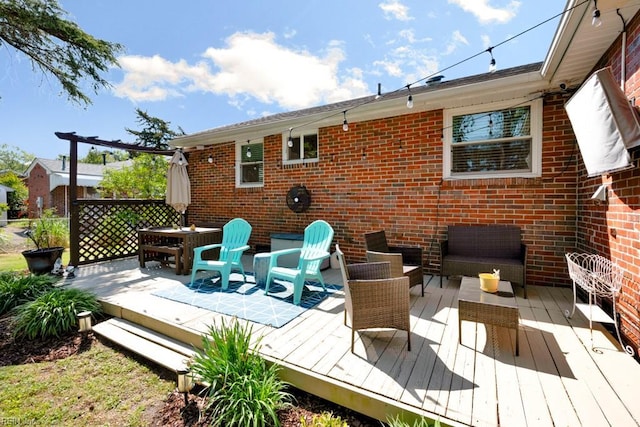 wooden deck featuring an outdoor living space