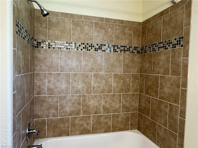 bathroom featuring tub / shower combination
