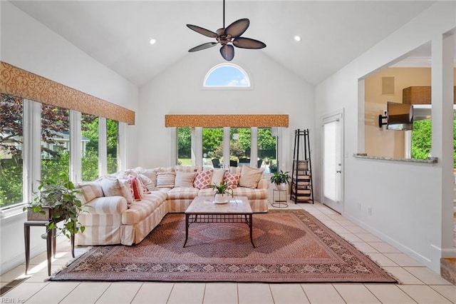 tiled living area featuring high vaulted ceiling, baseboards, a ceiling fan, and recessed lighting