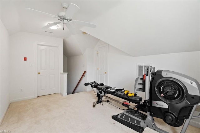exercise area with a ceiling fan, vaulted ceiling, carpet flooring, and visible vents