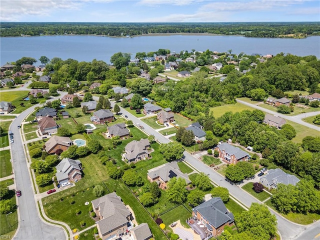 aerial view with a residential view and a water view