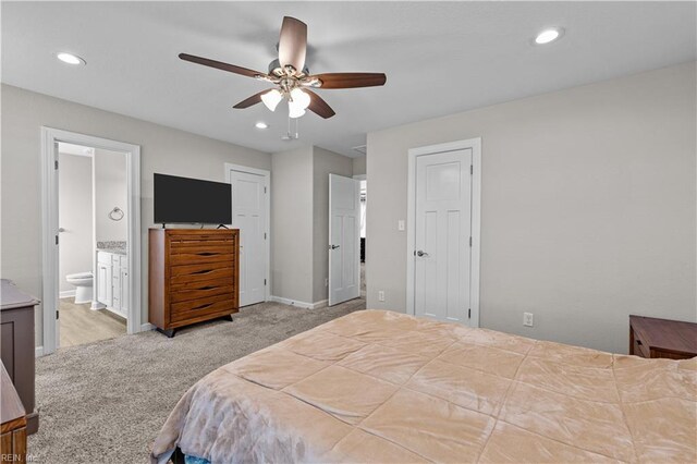 bedroom with recessed lighting, ensuite bath, carpet floors, baseboards, and a ceiling fan