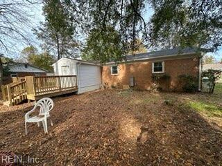 407 Wilson Ct, Suffolk, VA 23434 - rear view of property with a wooden deck