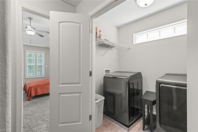 laundry room with independent washer and dryer, ceiling fan, and laundry area