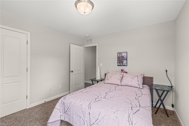 carpeted bedroom with baseboards and visible vents