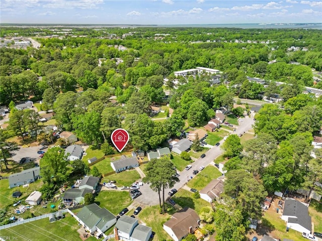 aerial view with a forest view and a residential view