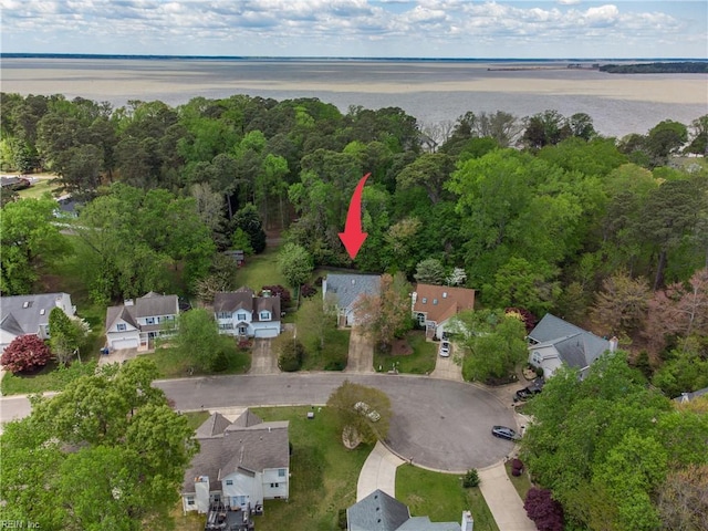 bird's eye view with a residential view and a water view