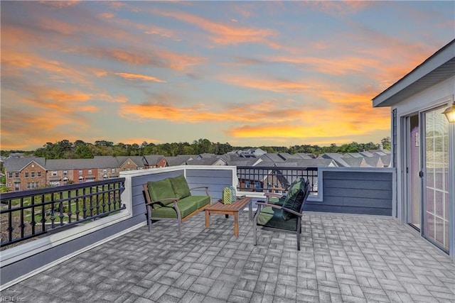 4901 Settlers Market Blvd, Williamsburg, VA 23188 - patio terrace at dusk featuring a residential view and a balcony