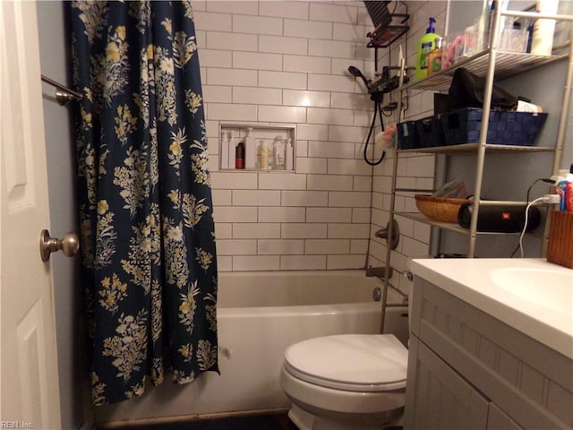 full bathroom with vanity, toilet, and shower / bath combination with curtain
