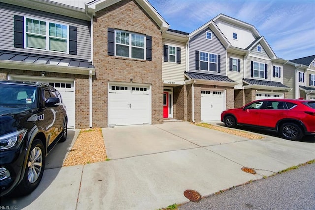 4768 Kilby Dr, Virginia Beach, VA 23456 - view of property featuring brick siding, a standing seam roof, metal roof, a garage, and driveway
