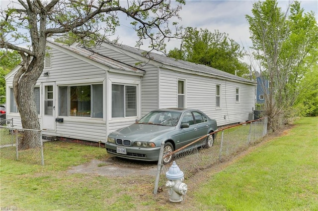 500 Factory St, Suffolk, VA 23434 - view of property exterior featuring fence and a yard