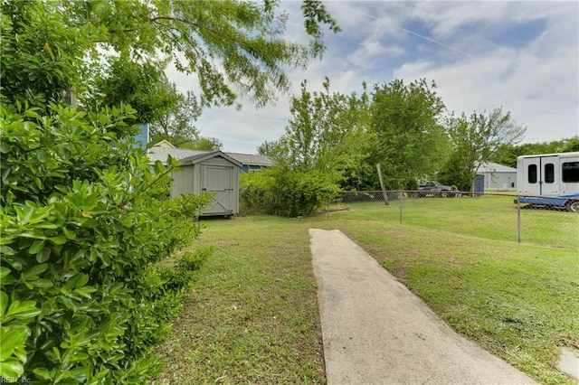 500 Factory St, Suffolk, VA 23434 - view of yard with a storage unit, fence, and an outbuilding